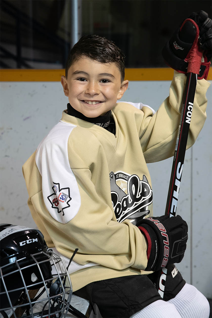 Sitting half-body photo on Players Bench